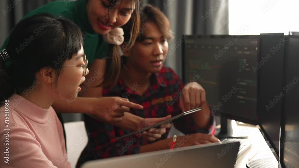 Slow motion back end software developer engineer for computer programming working together on debugging writing computing code, solving complex algorithms display on monitor in office. Burgeoning