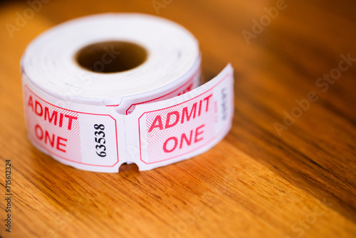 Admit one concert tickets on table close up photo