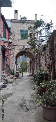 walking in Corniglia, narrow street, Liguria, Cinque Terre, Travel in Italy, winter time