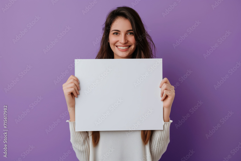 Woman Holding Blank Billboard On Purple Background Woman Holding Blank Billboard On Purple Background