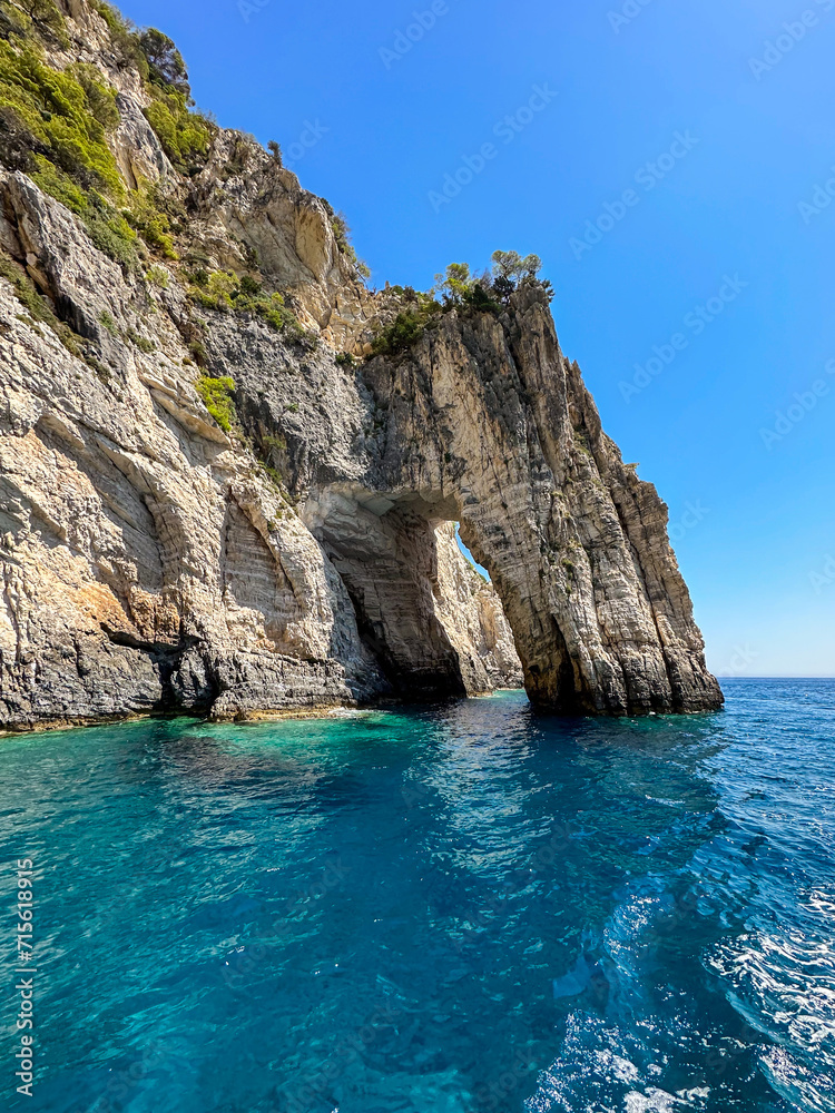 Vertical Scenery of Keri Cave in Zakynthos. Beautiful Nature with Rocky Arch and Turquoise Ionian Sea in Greece. Summer Landscape in Zante.