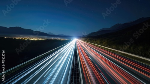 Light lines from a car on a highway among the mountains