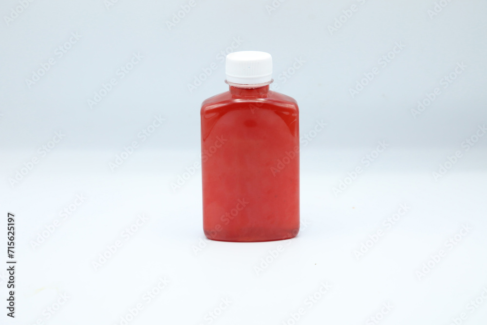 Red fruit juice in a jar. Red fruit juice in a jar.