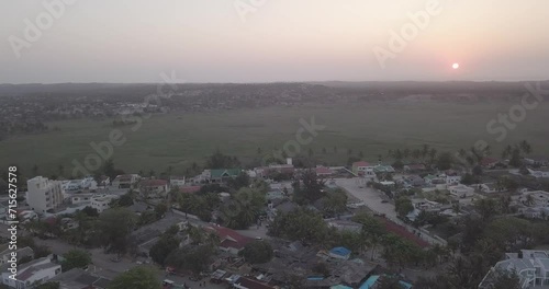 sunset drone shot over Tofo village, Mozambique. photo