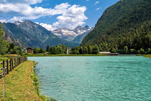 Lake Brusson and mountains under beautiful sky in Aosta Valley, Italy.