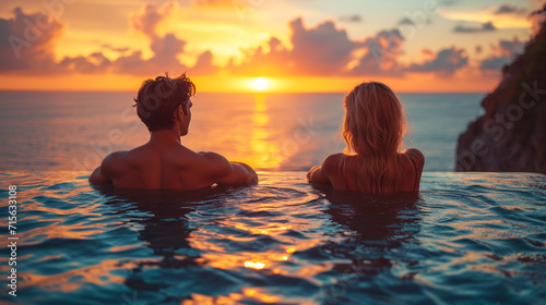 Sunset Serenity: Young Couple Relaxing by Tropical Resort Pool, Embracing the Tranquil Beauty of a Summer Vacation Evening © SithCreations