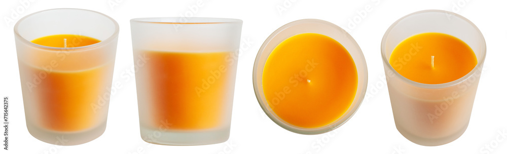 a set of orange candles in a frosted glass with the scent of manlarine, orange, cinnamon or sandalwood. On a blank background a set of orange candles in a frosted glass with the scent of manlarine, orange, cinnamon or sandalwood. On a blank background