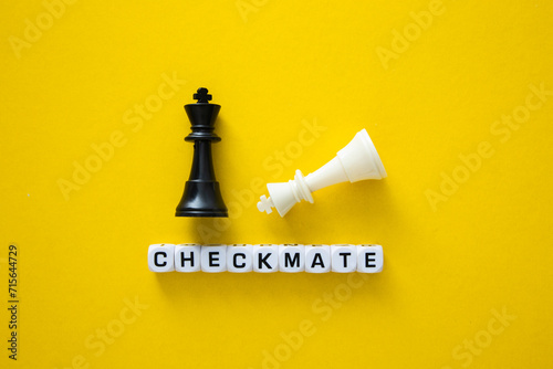 Checkmate word on yellow background