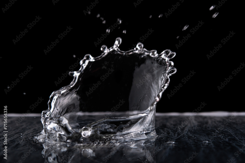 Water splash isolated on black background. Water texture. Water splash isolated on black background. Water texture.