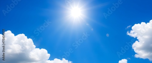Blue sky with sun. Panoramic view of sun and clouds.