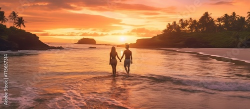 newlywed couple honeymoon by the beach at sunset © gufron