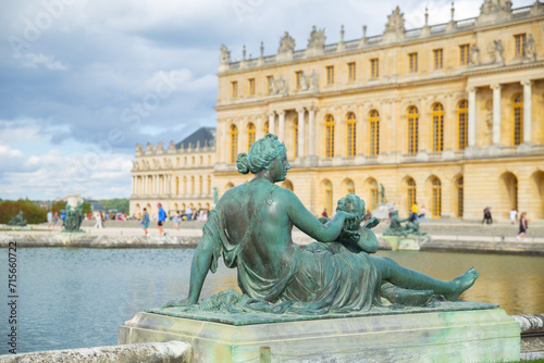 statue in the Versailles Palace garden in Paris, France 