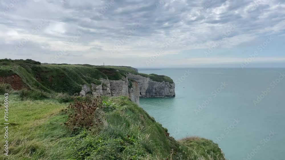 4K realtime,A white towering sea cliff stand out from sapphire blue sea in Étretat, France 4K realtime,A white towering sea cliff stand out from sapphire blue sea in Étretat, France