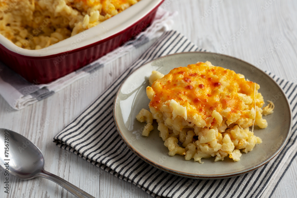 Homemade Baked Mac and Cheese on a Plate, side view. Homemade Baked Mac and Cheese on a Plate, side view.