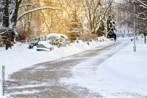 Konstfotografi Cleared from snow sidewalk in winter park