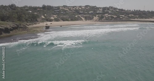 Drone shot with local surfer in Tofinho, Mozambique. photo