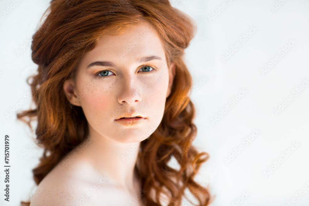 Beautiful young redhead woman with freckles portrait Beautiful young redhead woman with freckles portrait