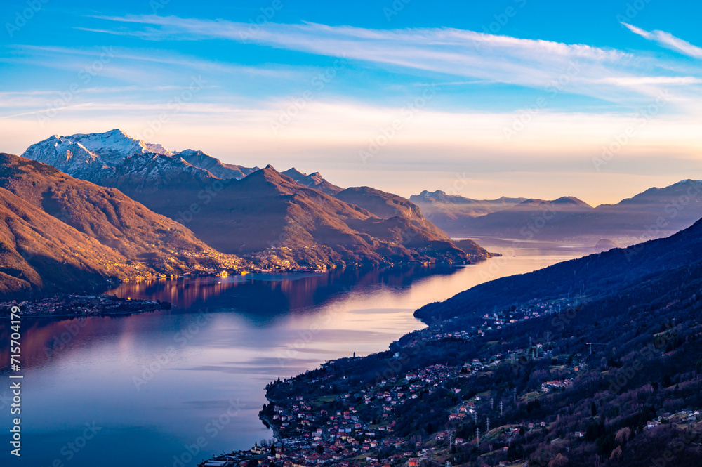 View of Lake Como in winter, looking south, from Musso, with the mountains above, Dervio, and the towns overlooking the lake.