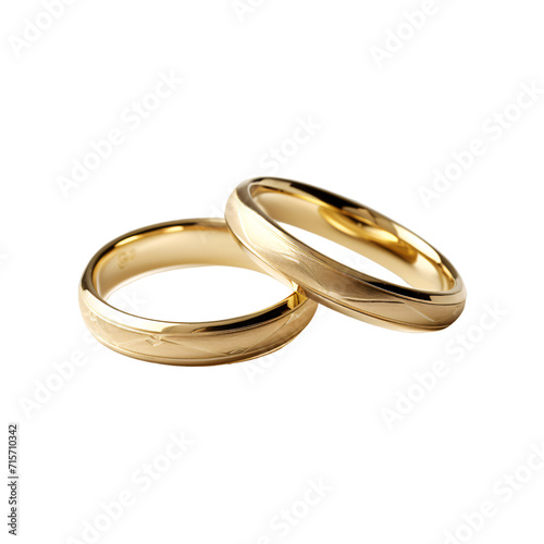 Two shiny gold wedding rings isolated in white background