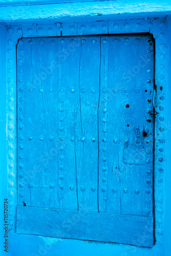 view of an old blue door in the blue city of Chefchaouen, Morocco © JK2507