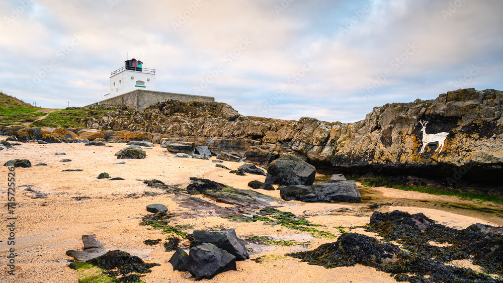 Stag Rock and Bamburgh Lighthouse. Also known as Blackrocks Point ...