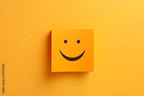 Yellow square smiley face on a yellow background