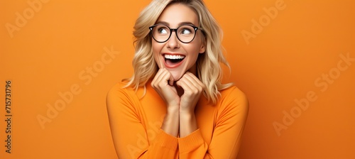 Smiling businesswoman in glasses looking at copy space for job opportunities or business services ad