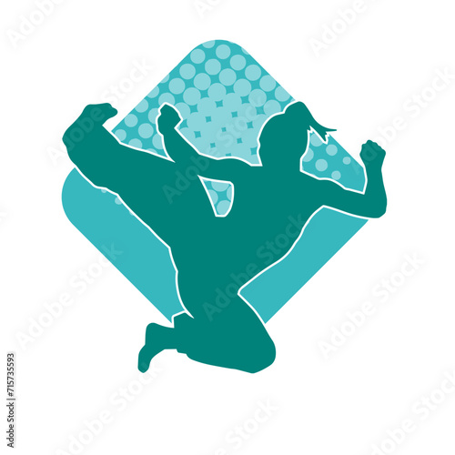 Silhouette of a slim female doing martial art pose. Silhouette of a martial art woman in action pose.