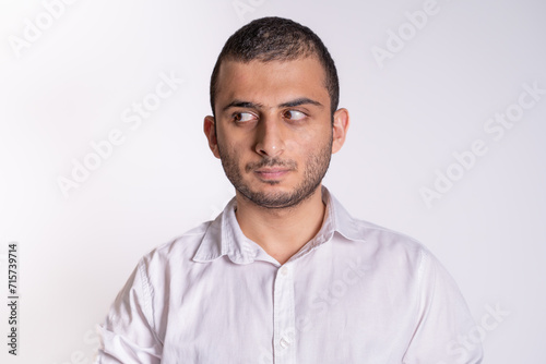 Isolated image of bearded middle eastern business man working on smartphone.