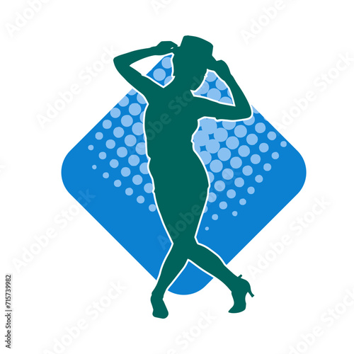 Silhouette of a female dancer in action pose. Silhouette of a woman dancing happily.