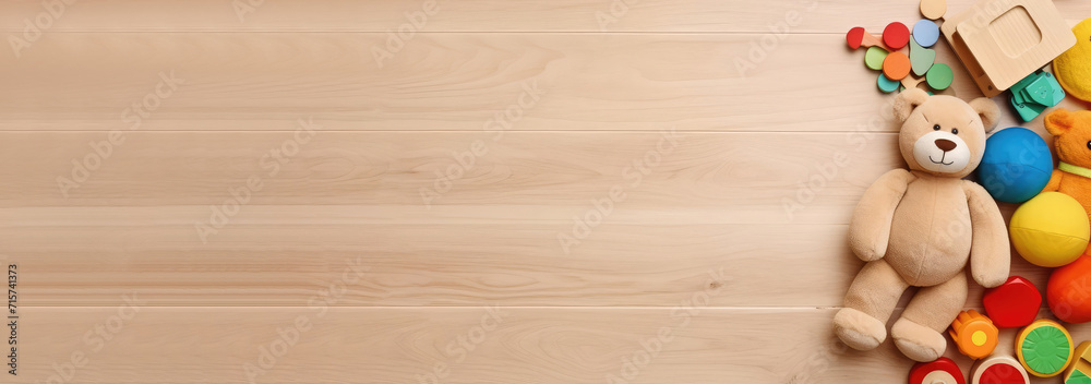 Top view of kids toys frame on wooden background with copy space. Top view of kids toys frame on wooden background with copy space.