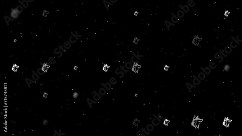 Template animation of evenly spaced wolf heads of different sizes and opacity. Animation of transparency and size. Seamless looped 4k animation on black background with stars photo