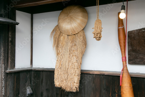 Japanese sandals, cape and hat handmade from straw from the countryside of the Niigata region in northern Japan. photo