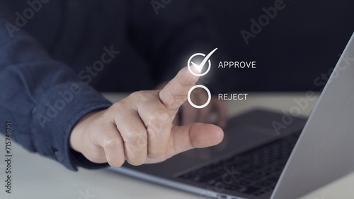 Businessman hand touching to correct sign symbol mark on approve box for document approval and project acceptance concept.