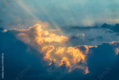 Dramatic cloudy sky background. Orange cloudy sunset sky.