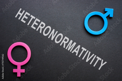 Male and female signs and inscription heteronormativity. photo