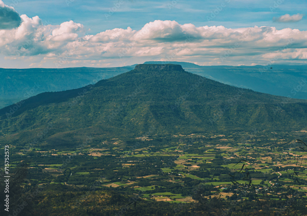 The stunning view of Thailand' Fuji in Forest Park from a tourist's standpoint as they go down a hill with background of blue sky, Rainforest, Thailand. Bird's eye view. Aerial view. 