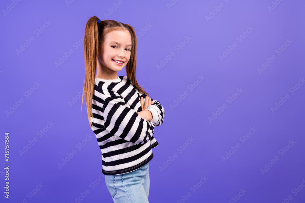 Fototapeta premium Photo of cool sweet small kid wear striped sweater arms folded empty space isolated violet color background