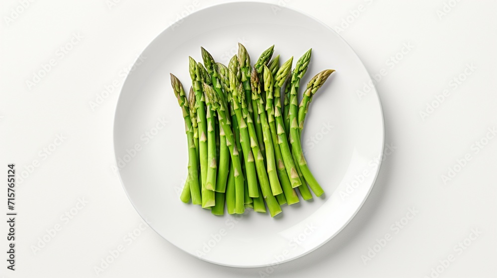 On a white background, on a white plate, green asparagus. Top view.
On a white background, on a white plate, green asparagus. Top view.