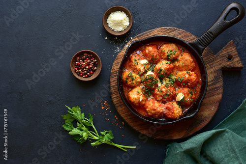 Meatballs with rice in tomato sauce. Top view with copy space.