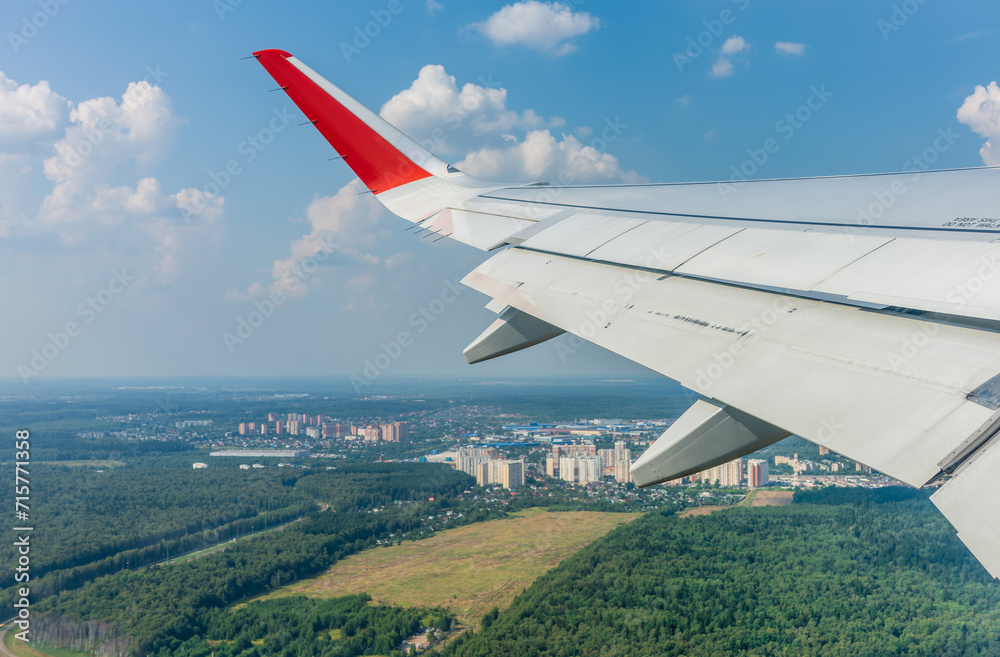 View from the airplane window during takeoff at Sheremetyevo airport at summer