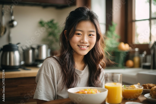 young woman having breakfast