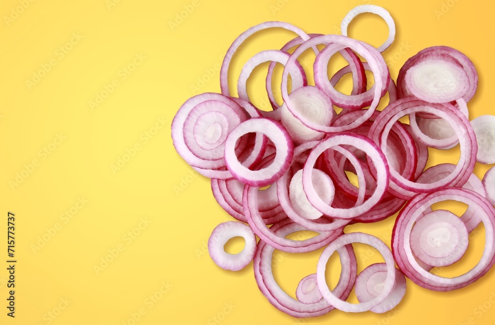 fresh raw red onion slices on desk