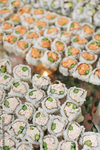 sushi on a plate with chopsticks