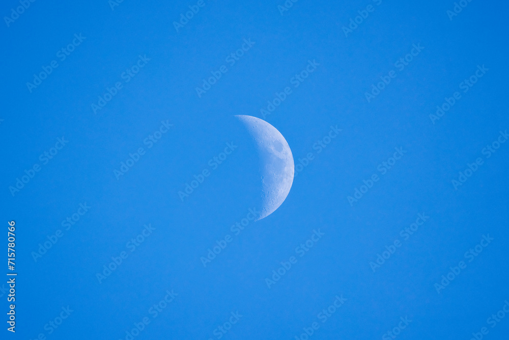 landscape with the moon at sunset in the blue sky landscape with the moon at sunset in the blue sky
