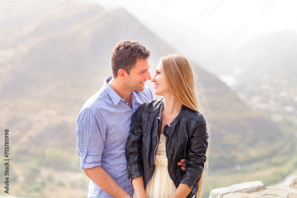 Beautiful happy smiling couple embracing Beautiful happy smiling couple embracing