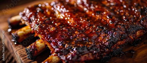The succulent, red spare ribs sizzle on the indoor grill, filling the room with the mouth-watering aroma of churrasco food and promising a mouthful of juicy, tender meat in every bite photo
