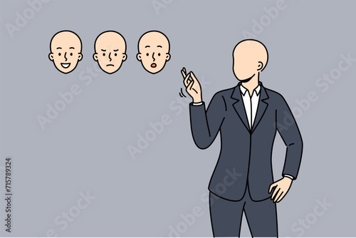 Faceless business man chooses mask face with different emotions, for concept of ability to manage mood. Businessman in formal suit choosing suitable emotions to manipulate during negotiations