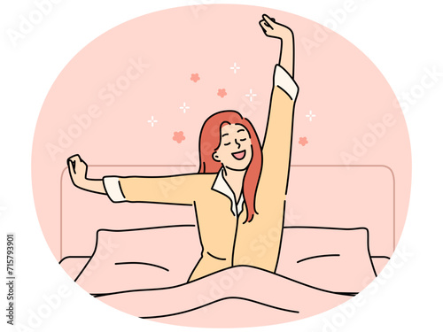 Happy woman stretch wakeup in bed