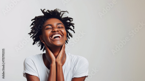 Happy black woman ,Happy person engaged in a fulfilling hobby. Laughing. Optimistic, isolated on background photo